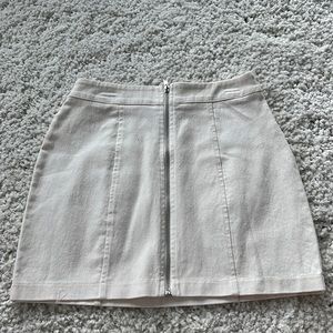 Cream zip up mini skirt